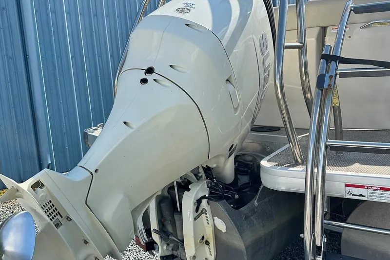 Slide: The Image of 2017 Godfrey AQUA PATIO 235UL boat engine and ladder detail. - 6