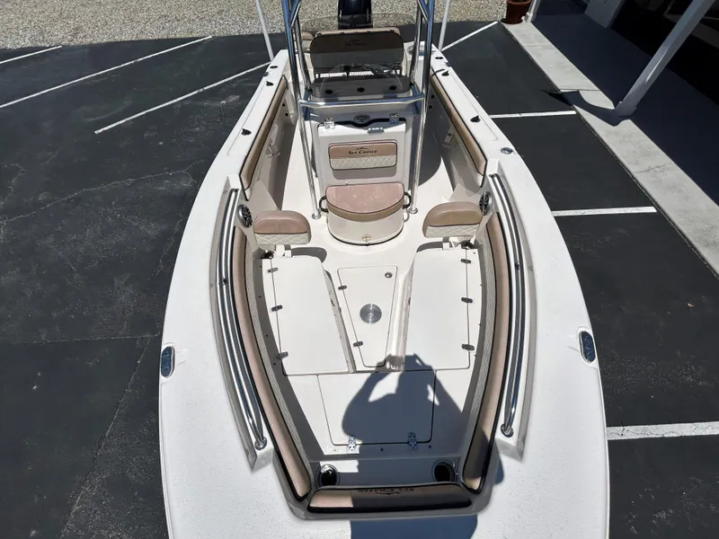 Slide: The Image of 2023 Sea Chaser 22 HFC boat interior with seating and storage compartments. - 14