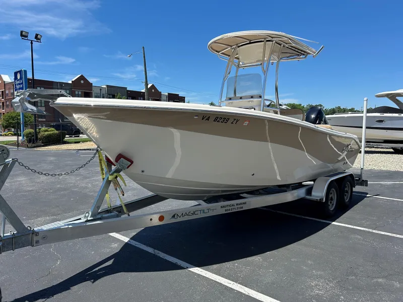Slide: The Image of 2023 Sea Chaser 22 HFC boat on trailer in parking lot, sunny day. - 3