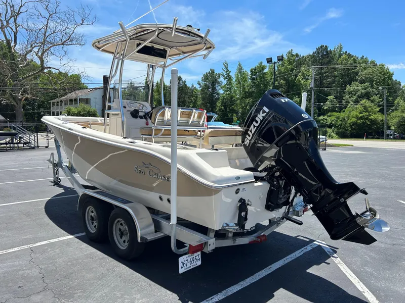 Slide: The Image of 2023 Sea Chaser 22 HFC boat on trailer with Suzuki outboard motor. - 4