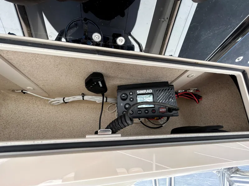 Slide: The Image of 2023 Sea Chaser 22 HFC boat console with Simrad marine radio equipment. - 7