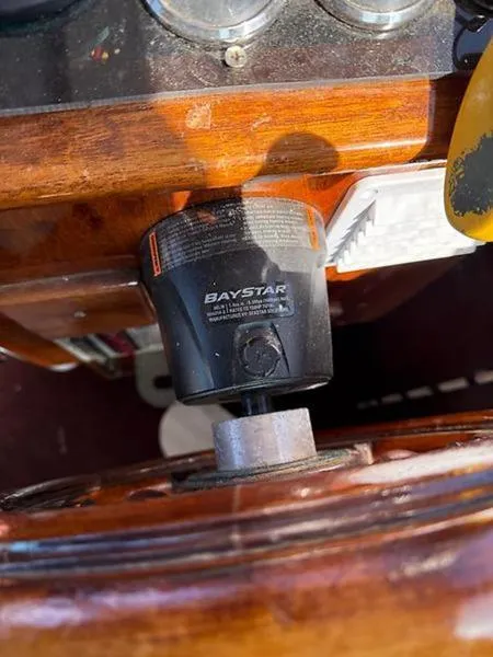 Slide: The Image of BayStar steering system on 1999 Glen-L BO-JEST boat dashboard. - 23