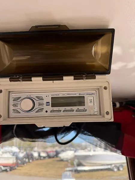 Slide: The Image of 1999 Glen-L BO-JEST boat stereo system with protective cover. - 9