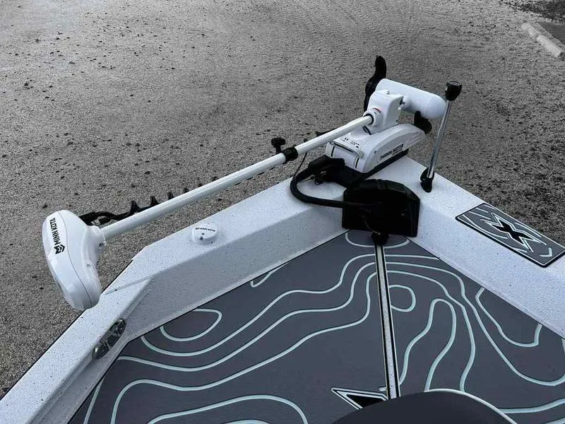 Slide: The Image of 2025 Xpress H20 BAY boat with trolling motor on deck, featuring sleek design and modern technology. - 10