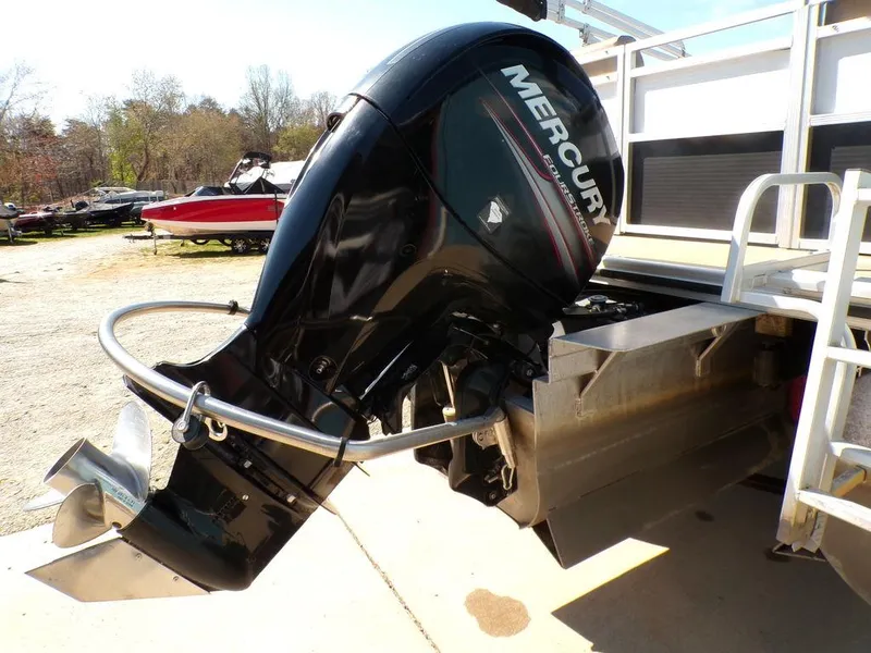 Slide: The Image of Outboard motor on 2018 Crestliner 220 RALLY boat, featuring Mercury branding. - 15