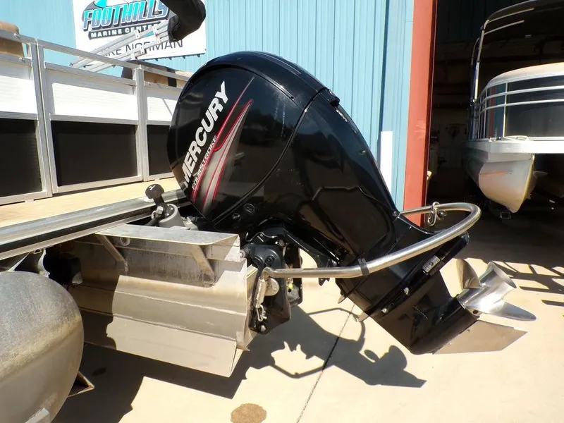 Slide: The Image of Outboard motor on 2018 Crestliner 220 RALLY boat, featuring Mercury branding. - 17