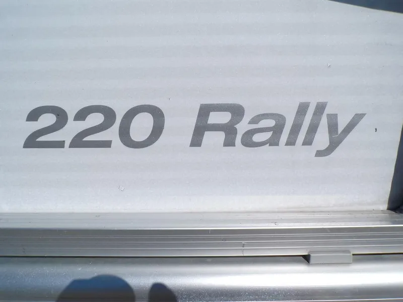 Slide: The Image of 2018 Crestliner 220 Rally boat model name on side panel. - 18