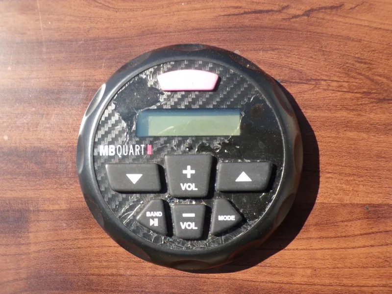 Slide: The Image of MB Quart audio control panel on 2018 Crestliner 220 RALLY boat dashboard. - 7