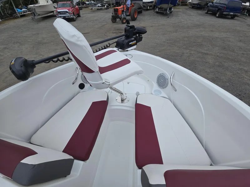 Slide: The Image of 2019 Tahoe 500 TF boat interior with maroon and white seating. - 13