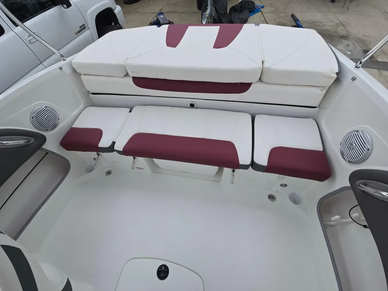 Slide: The Image of 2019 Tahoe 500 TF boat interior with white and maroon seating. - 16