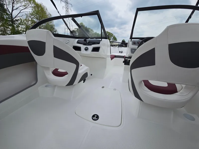 Slide: The Image of 2019 Tahoe 500 TF boat interior with modern seating and dashboard design. - 17