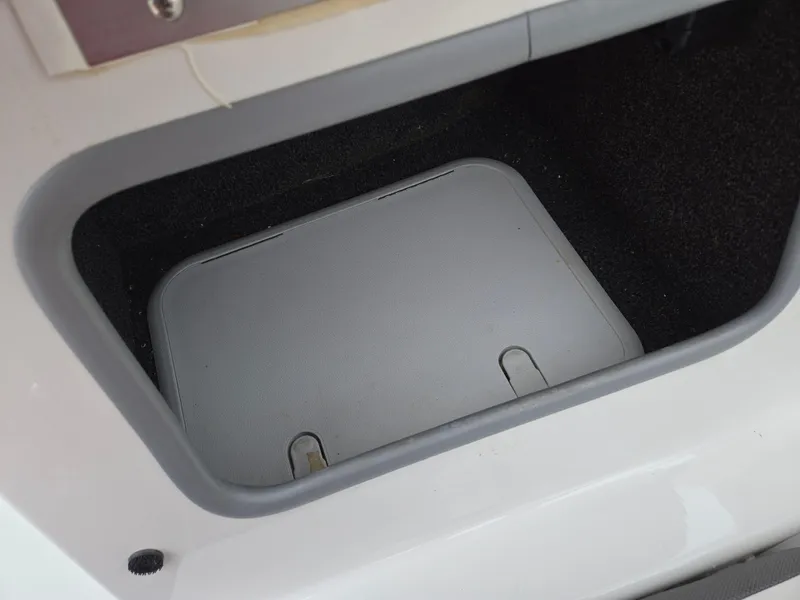 Slide: The Image of Storage compartment in a 2019 Tahoe 500 TF boat. - 27