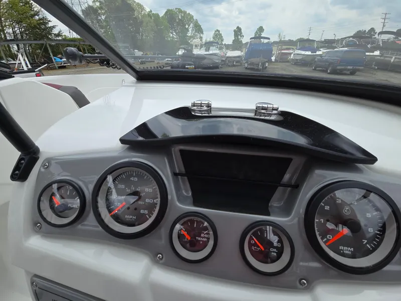 Slide: The Image of Dashboard of a 2019 Tahoe 500 TF boat with gauges and controls. - 35