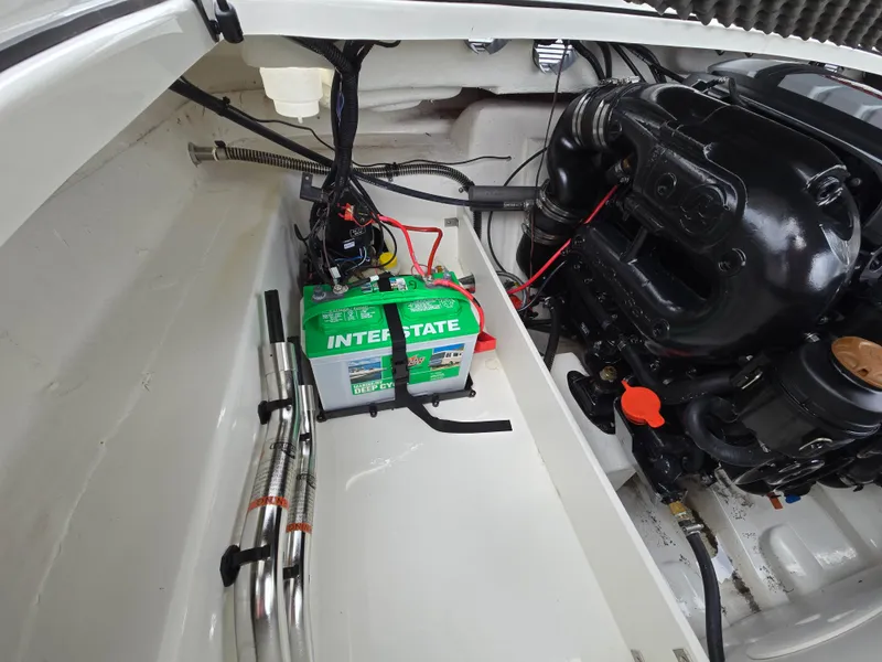 Slide: The Image of Engine compartment of a 2019 Tahoe 500 TF with Interstate battery and wiring. - 38