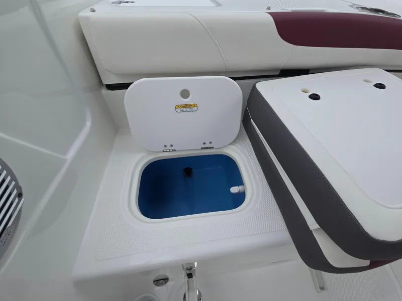 Slide: The Image of 2019 Tahoe 500 TF boat interior with open storage compartment. - 45