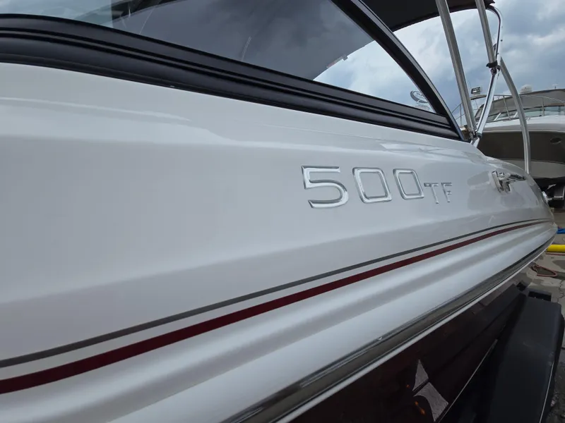 Slide: The Image of 2019 Tahoe 500 TF boat side view with model name visible. - 7