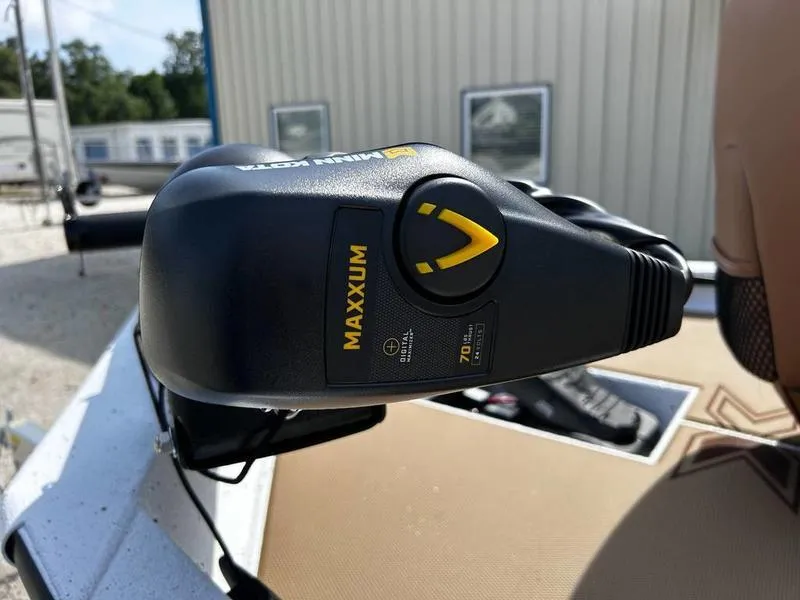 Slide: The Image of Minn Kota Maxxum trolling motor on 2025 Xpress H20 Crappie boat, outdoor setting. - 11