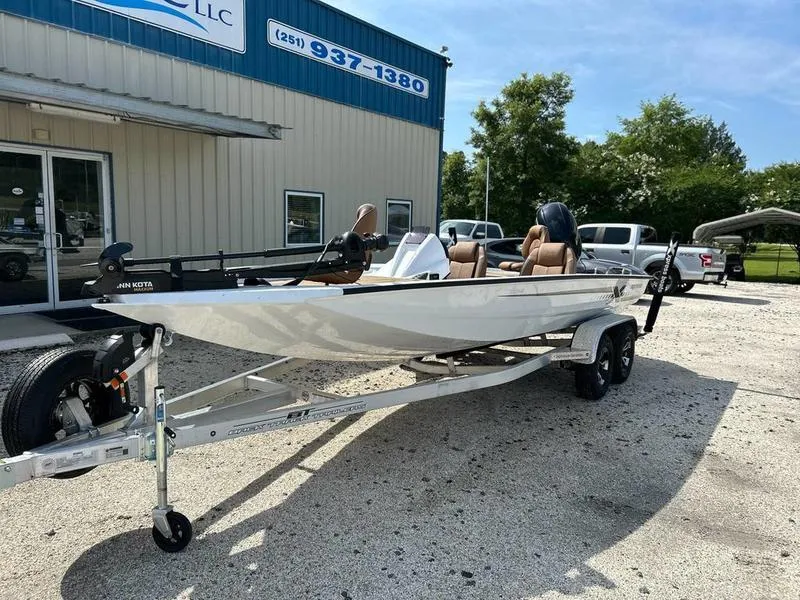 Slide: The Image of 2025 Xpress H20 Crappie boat on trailer outside dealership. - 3