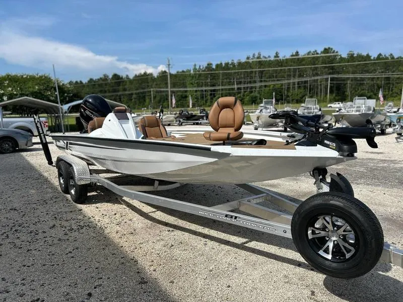 Slide: The Image of 2025 Xpress H20 Crappie boat on trailer, featuring sleek design and comfortable seating. - 5
