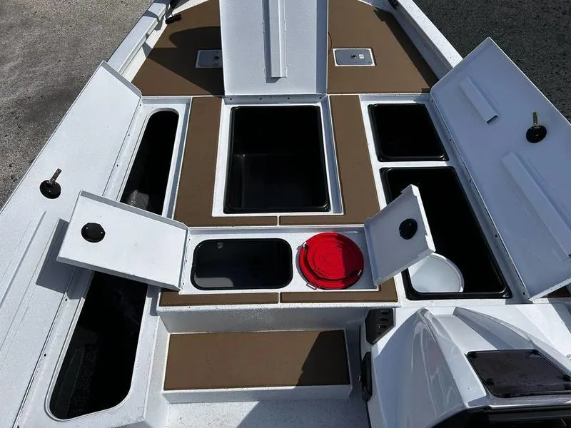 Slide: The Image of 2025 Xpress H20 Crappie boat interior with multiple storage compartments open. - 8