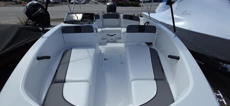 Slide: The Image of 2025 Tahoe T16 boat interior with seating and storage compartments. - 5