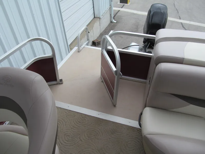 Slide: The Image of 2014 Sun Tracker Party Barge 20 DLX interior with seating and open gate. - 12