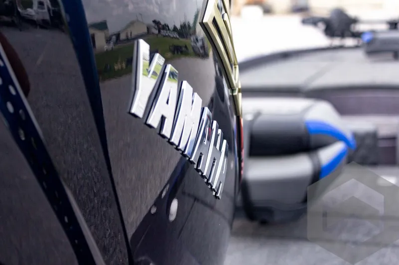Slide: The Image of 2025 Caymas CX 21 PRO boat with Yamaha branding, close-up view. - 19