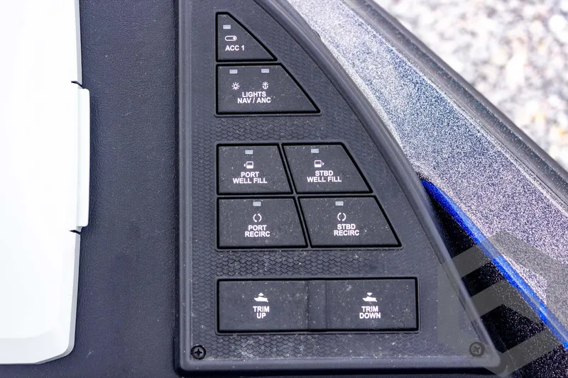 Slide: The Image of Control panel of 2025 Caymas CX 21 PRO boat with various function buttons. - 31