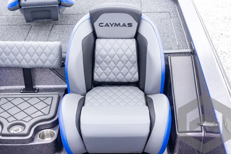 Slide: The Image of 2025 Caymas CX 21 PRO boat seat with diamond stitching and blue accents. - 34