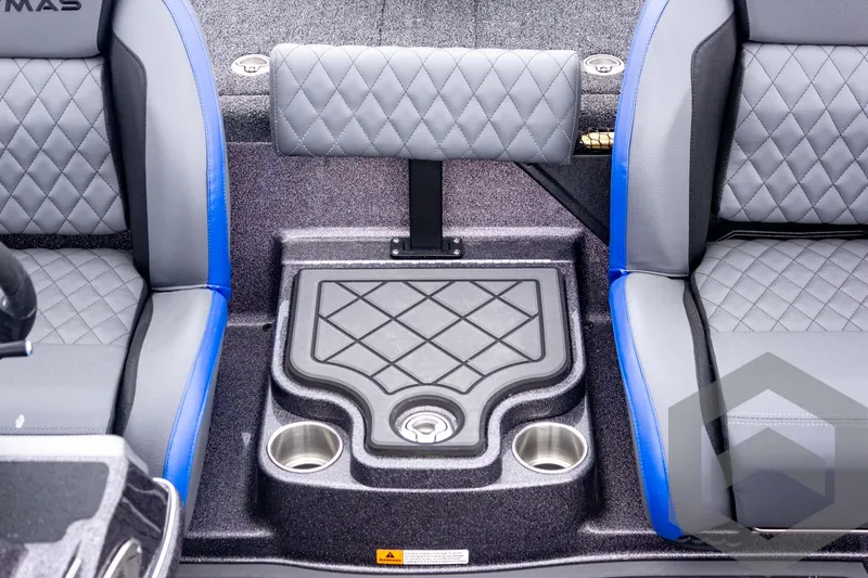 Slide: The Image of 2025 Caymas CX 21 PRO boat interior with quilted seats and cup holders. - 36