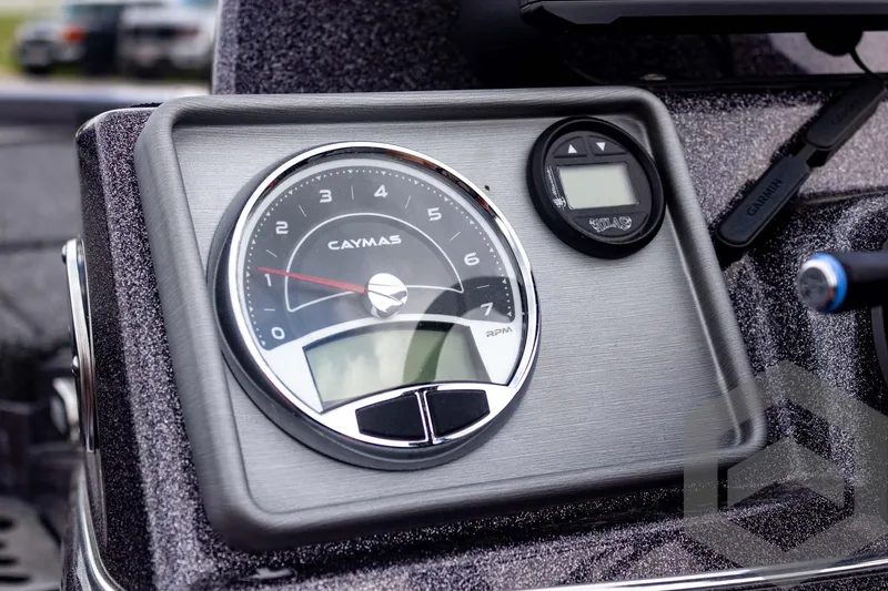 Slide: The Image of Dashboard of 2025 Caymas CX 21 PRO boat with speedometer and digital display. - 39