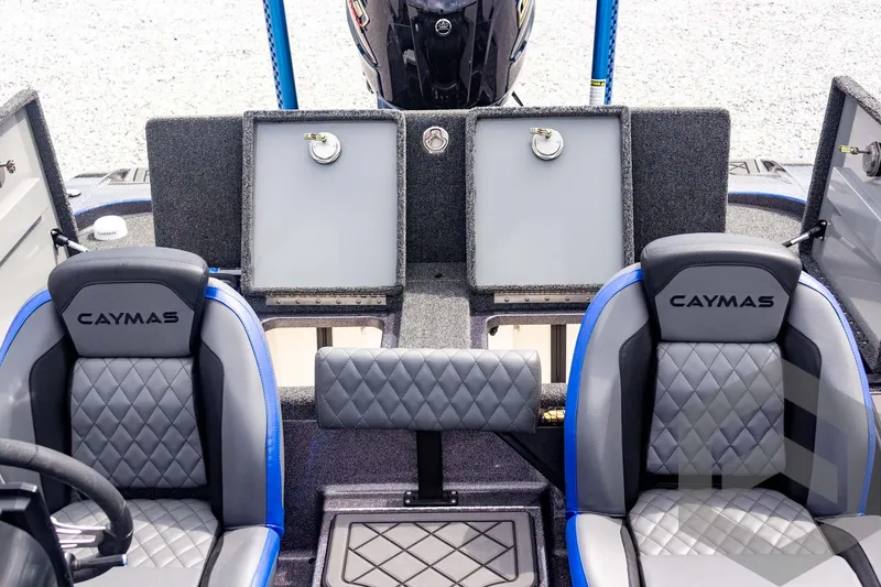 Slide: The Image of 2025 Caymas CX 21 PRO boat interior with dual seats and storage compartments. - 44