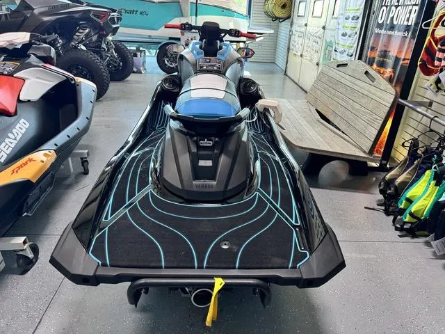 Slide: The Image of 2024 Yamaha WaveRunners GP HO with Audio, sleek design in showroom setting. - 3