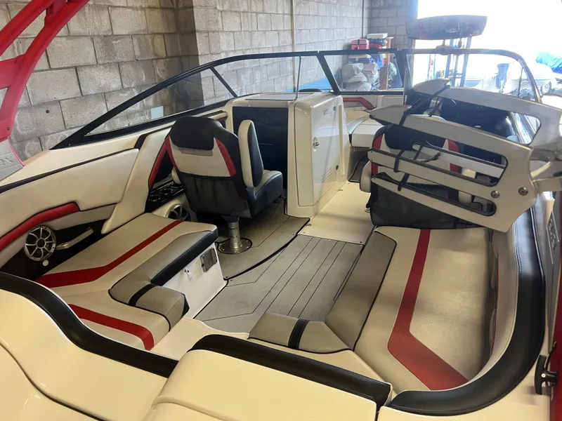Slide: The Image of 2020 Yamaha Boats 242X interior with sleek seating and modern design. - 2