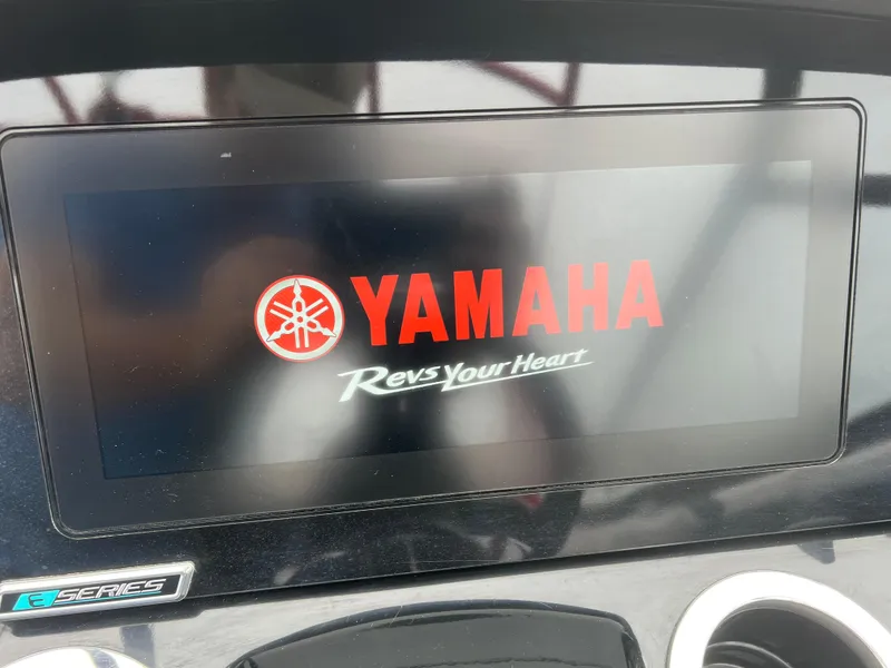 Slide: The Image of Yamaha Boats 242X 2020 dashboard display with logo and "Revs Your Heart" slogan. - 22