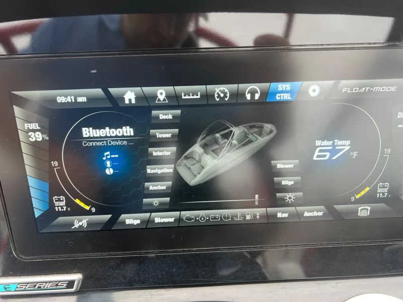 Slide: The Image of Yamaha Boats 242X 2020 dashboard display showing Bluetooth and water temperature at 67°F. - 23