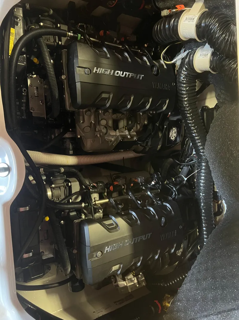 Slide: The Image of 2020 Yamaha Boats 242X high output engines in engine compartment. - 25