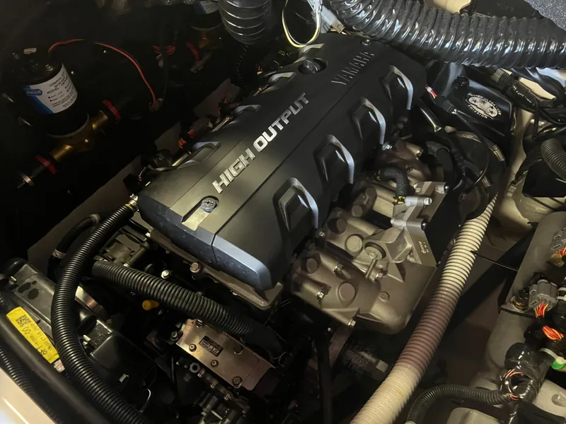 Slide: The Image of 2020 Yamaha Boats 242X engine, high output, detailed view in boat compartment. - 26