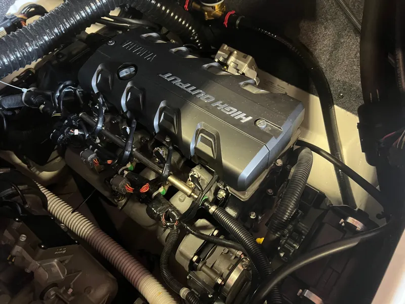 Slide: The Image of 2020 Yamaha Boats 242X engine compartment showcasing a high-output engine. - 27