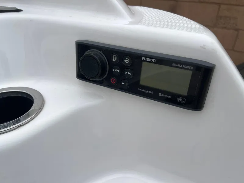 Slide: The Image of Control panel on 2020 Yamaha Boats 242X, featuring Fusion MS-RA70NSX stereo system. - 36