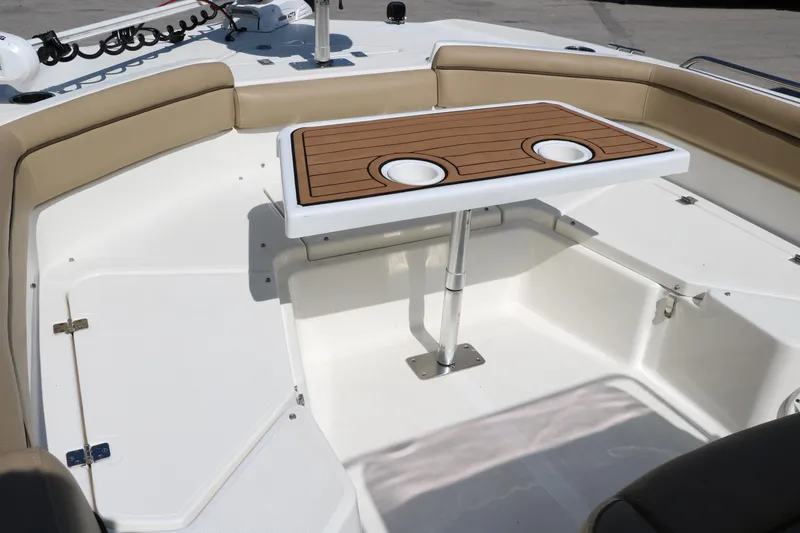 Slide: The Image of 2020 NauticStar 211 Hybrid boat interior with steering console and seating. - 22