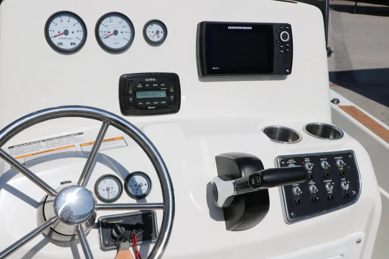 Slide: The Image of 2020 NauticStar 211 Hybrid boat with a digital component installed. - 29