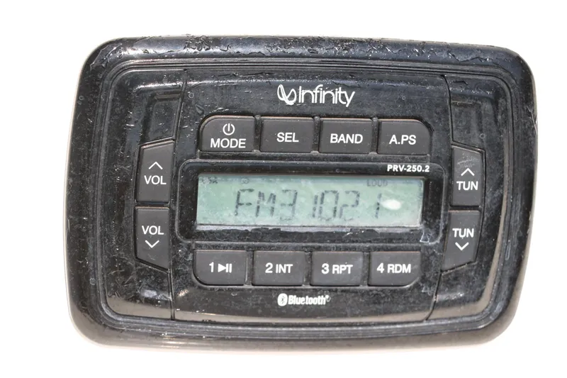 Slide: The Image of 2020 NauticStar 211 Hybrid boat dashboard with steering wheel, gauges, and controls. - 30