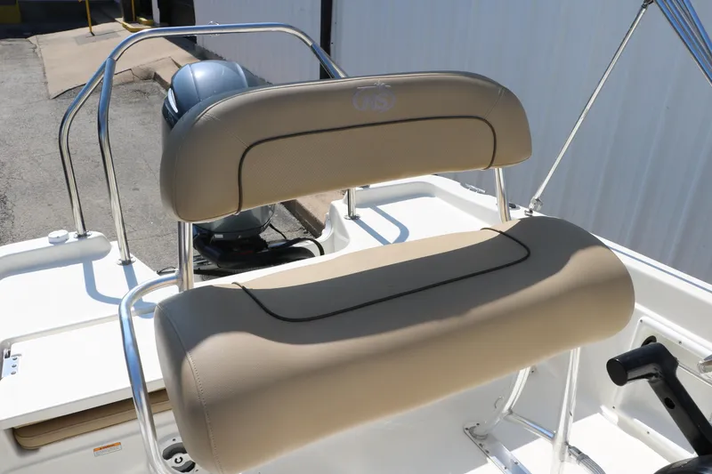 Slide: The Image of 2020 NauticStar 211 Hybrid boat interior with seating and equipment. - 39