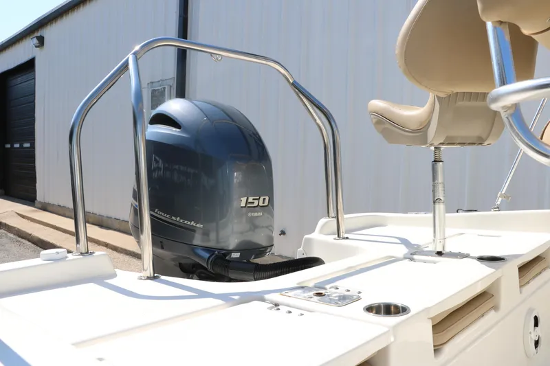 Slide: The Image of 2020 NauticStar 211 Hybrid boat with Yamaha engine on trailer. - 7