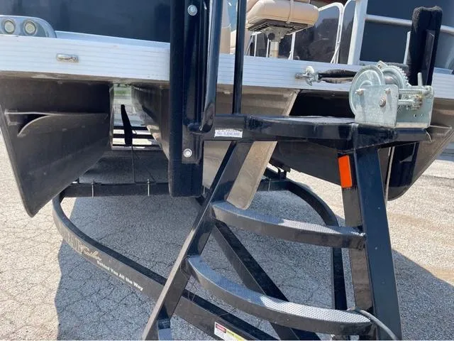 Slide: The Image of 2019 SunCatcher V 322CC boat on trailer with winch and steps. - 18