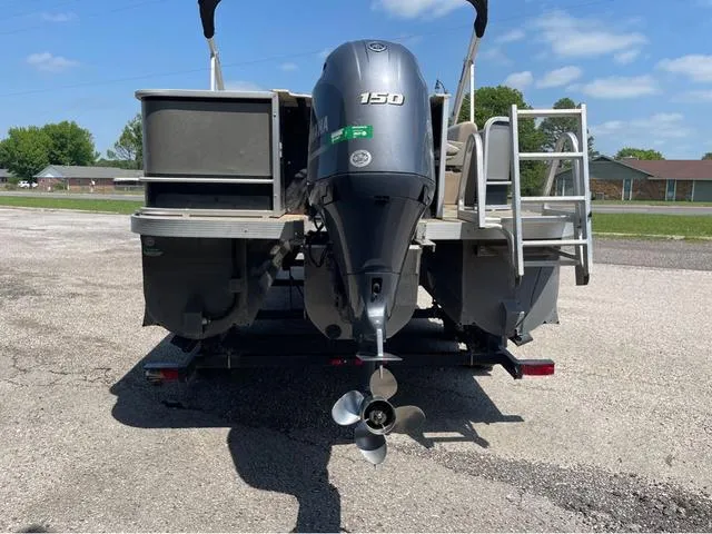 Slide: The Image of 2019 SunCatcher V 322CC boat with 150 HP engine, rear view on trailer. - 5