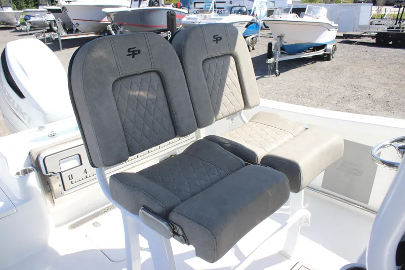 Slide: The Image of 2023 Sea Pro 239 Center Console boat seats with quilted design and logo. - 16