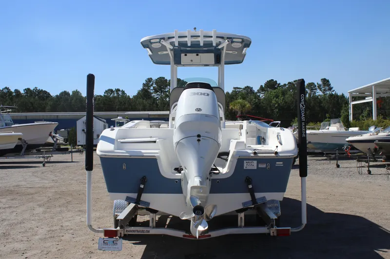 Slide: The Image of 2023 Sea Pro 239 Center Console boat on trailer, rear view. - 5
