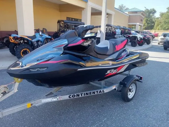 Slide: The Image of 2025 Kawasaki Waverunner Ultra 160LX-S on trailer, parked outside dealership. - 10